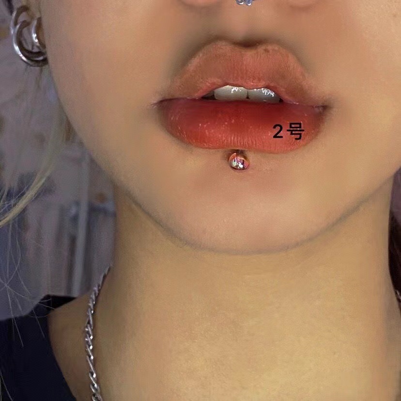 Labret stud lip piercing jewelry styling detail