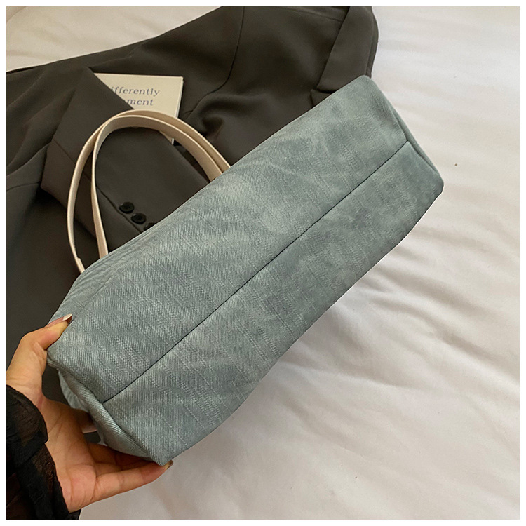 Korean style simple and versatile bag for women, new summer 2025 fashion and niche handbag, large capacity tote bag for commuting undefined