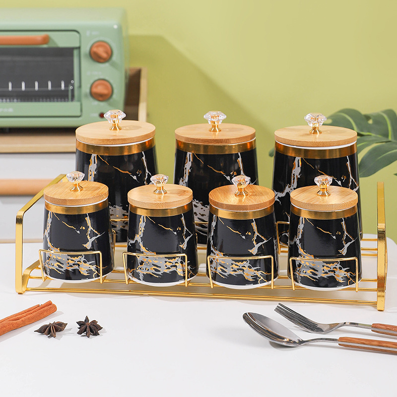 Juego de caja de condimento de comercio exterior de exportación frasco de condimento creativo con estante frasco de sellado de cerámica de lujo ligero frasco de almacenamiento de cocina