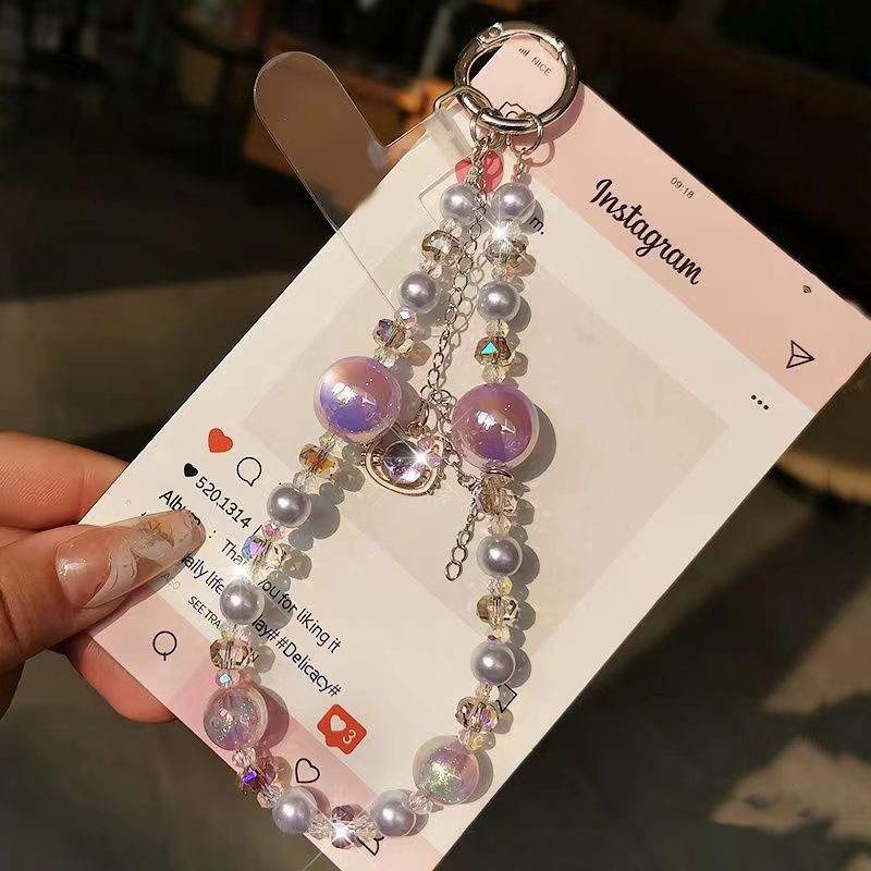 Creativo teléfono móvil colgante colgante gato borla ligero lujo corto hada gas perla cristal cadena portátil cordón de carcasa para teléfono móvil