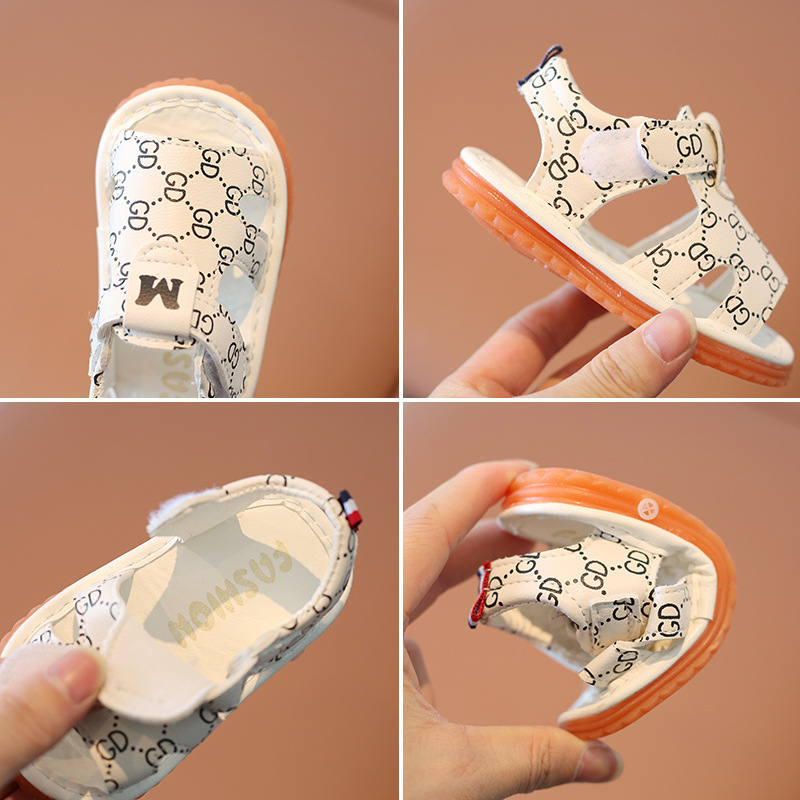 A new soft sole children's sandal for summer 2022 Baotou baby sandal for boys and girls is called baby shoes