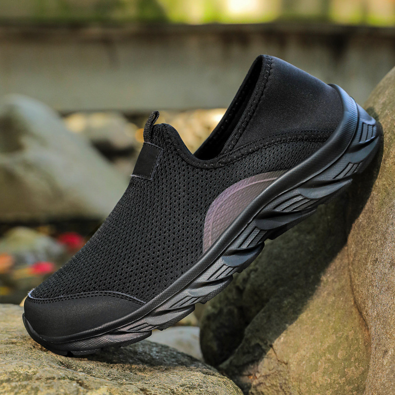 Nuevos zapatos de deporte casuales de tejido volador para hombres con suela suave de malla transpirable zapatos de carrera comercio exterior al por mayor transfronterizo