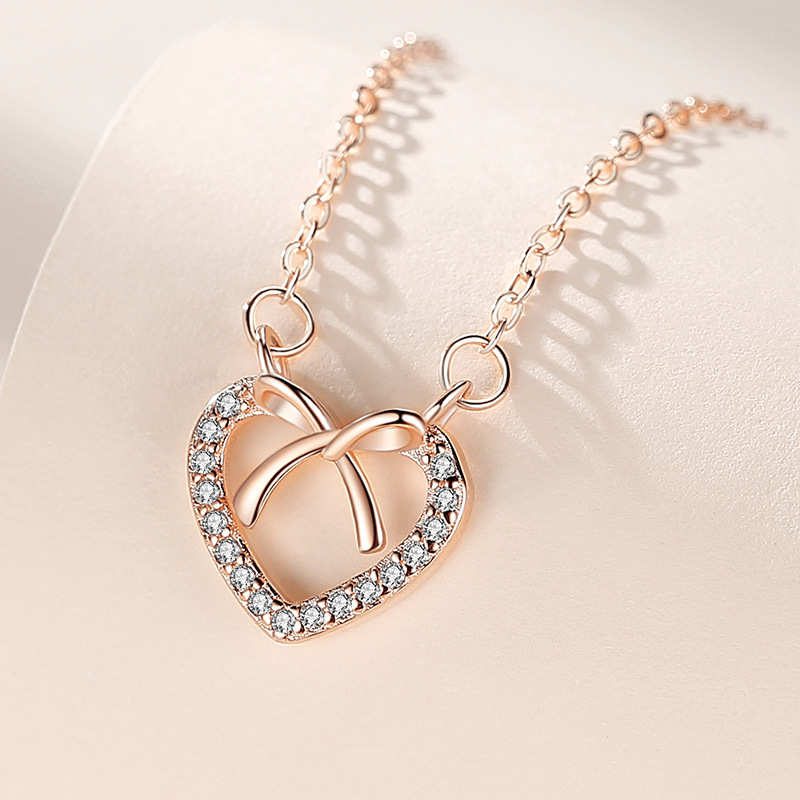 Collar de plata esterlina s925 collar de arco en forma de corazón para las mujeres estilo japonés y coreano de moda estilo coreano en forma de corazón diamante clavícula cadena diseño