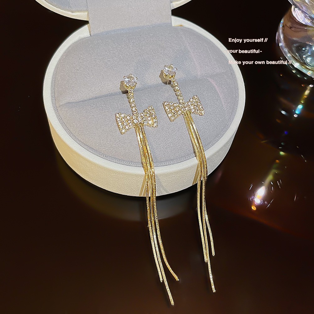 S925 aguja de plata elegante borla pendientes de alta gama simple cara de adelgazamiento pendientes de todo fósforo estilo coreano nuevos pendientes de moda al por mayor