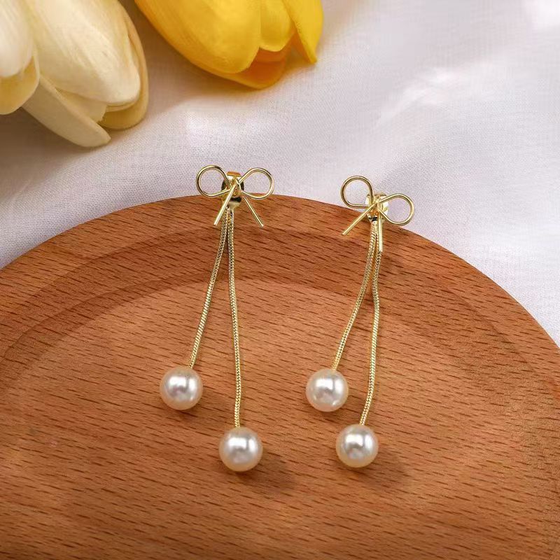 Pendientes largos con flecos elegantes y diamantes con aguja de plata Pendientes de todo fósforo de temperamento de nicho Pendientes simples y ligeros de lujo de alta gama Mujeres