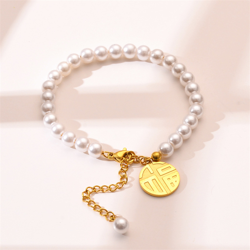 Ventas transfronterizas calientes de acero de titanio Fu marca imitación pulsera de perla mujer no decoloración brazalete de joyas de mano de diseño de alta gama al por mayor