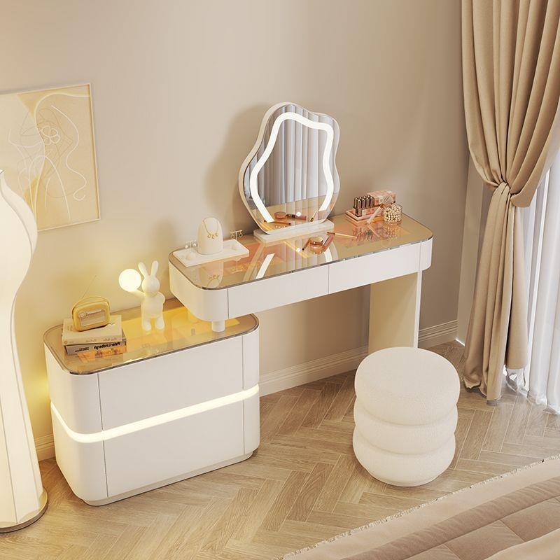 Cajones de aire de crema de atmósfera de lámpara de vestuario de almacenamiento en un armario de lujo moderno y simple mesa de maquillaje retráctil mesa transparente