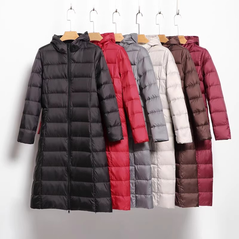 2024 autumn and winter new lightweight down jacket Women's Mid-length long over-the-knee lengthened hooded slim thin coat cross-border 2024 autumn and winter new lightweight down jacket Women's Mid-length long over-the-knee lengthened hooded slim thin coat cross-border