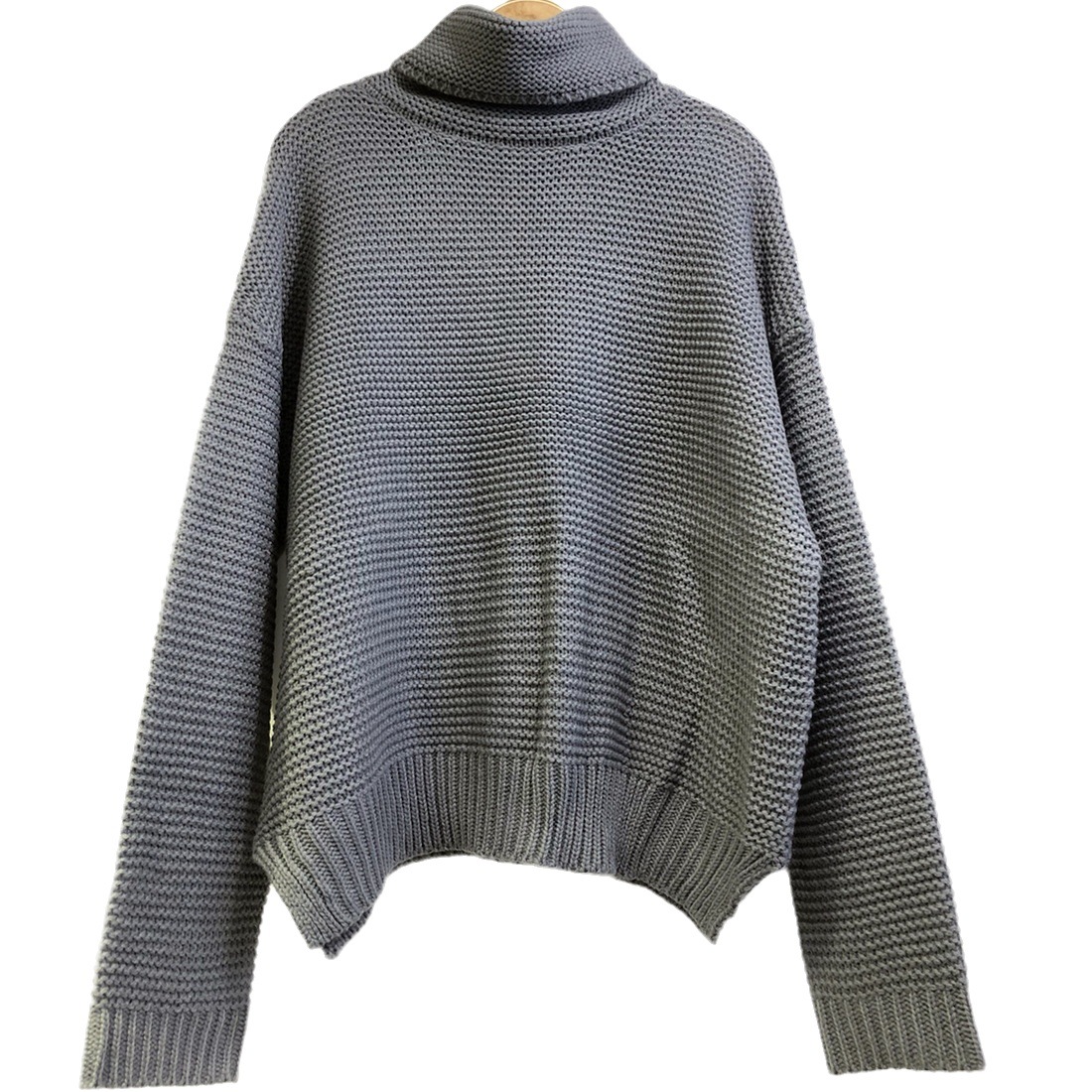 2023 otoño e invierno europeo y americano Amazon eBay popular color sólido suéter de manga larga cuello alto suéter de las mujeres entrega de una sola pieza