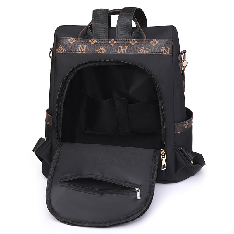 Transfronterizo al por mayor 2024 verano nuevo estilo coreano damas mochila antirrobo moda salvaje mochila de viaje de gran capacidad