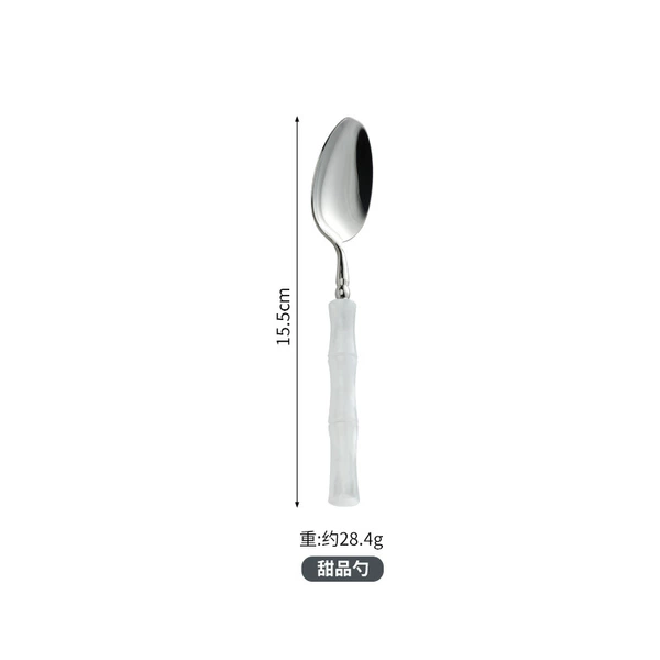 White dessert spoon