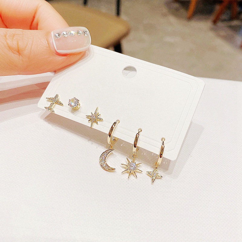 Wholesale Korean Zircon Micro-inlaid Small Plane Star Moon Copper Earrings Nihaojewelry display picture 8
