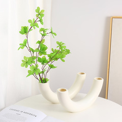 創意ins風プラスチック花瓶の造花花瓶のテーブルに生け花を並べます。