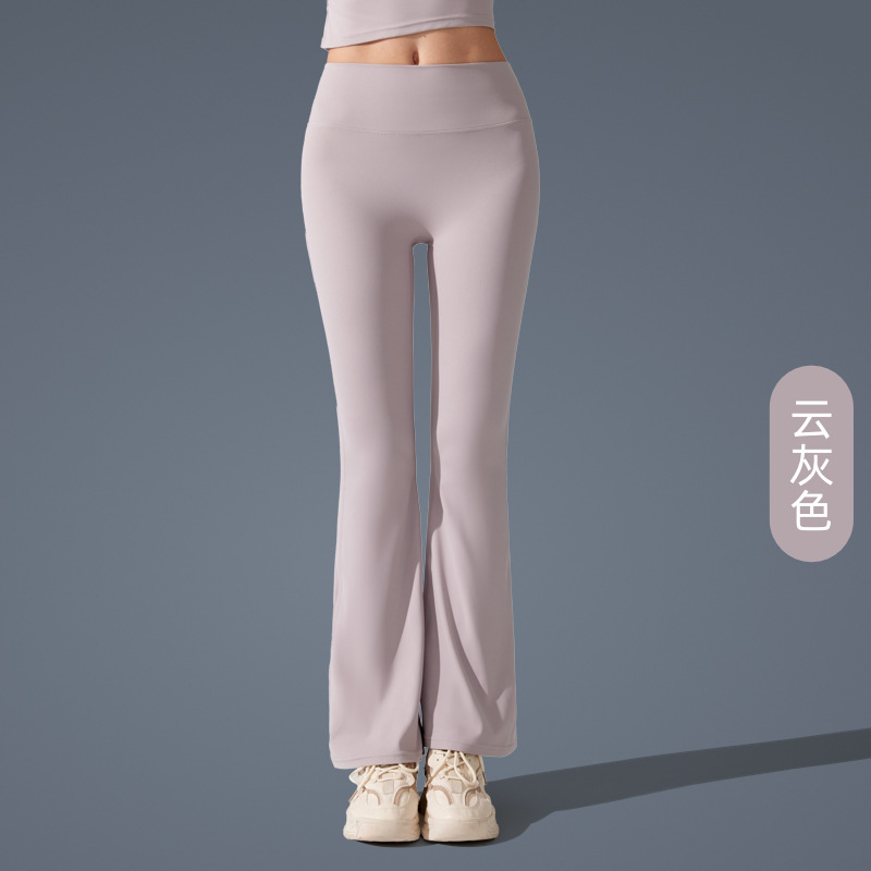 Pantalones de trompeta antibacterianos de sensación desnuda en Europa y los Estados Unidos nuevos estilos deportivos pantalones de yoga casuales muestran pantalones de fitness de cintura alta de plástico delgado