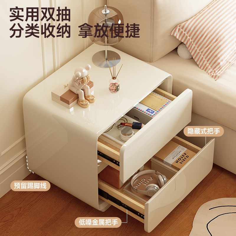 Mesa de cabezal de cama de madera maciza pintada dormitorio doméstico 2025 explosión pequeña crema de lujo ligero gabinete de almacenamiento de artículos de alto nivel