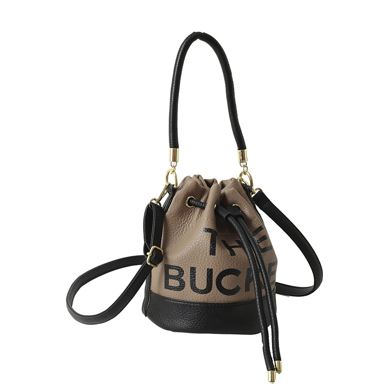 Bolso de hombro femenino casual todo-fósforo diseño de nicho sentido contraste color costuras cubo bolso de mano moda tendencia bandolera