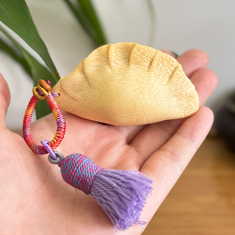 보라색 술로 엮은 만두