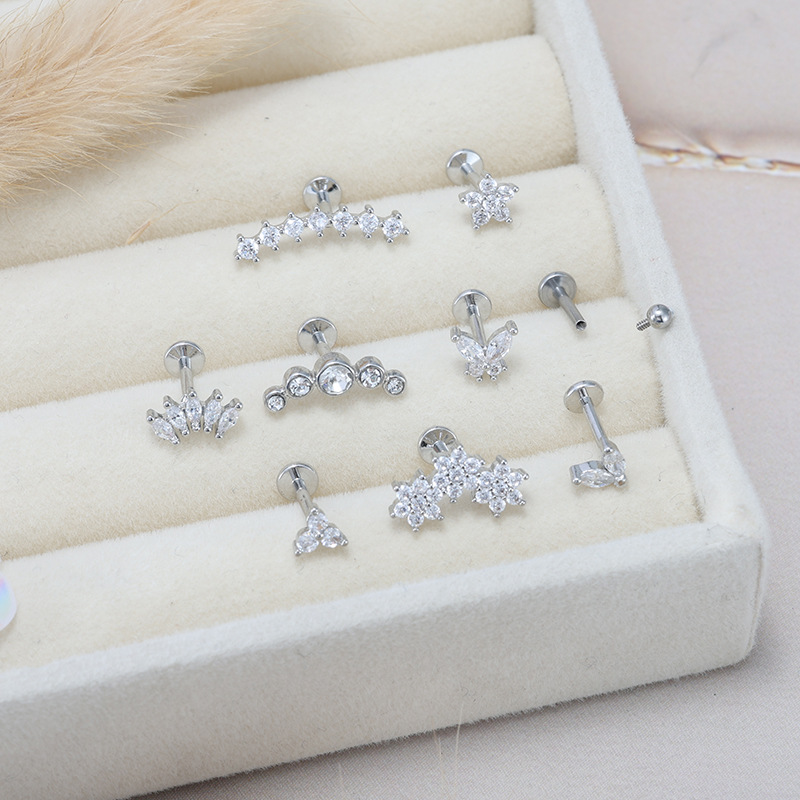 Silver pointed spike labret stud material detail