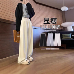 カシミヤのバナナのカジュアルなズボンの女性の春と秋のベルベットの高腰の垂れ下がった感じの柔らかいモチとしたゆったりとしたシンプルな厚い太もものズボンの女性