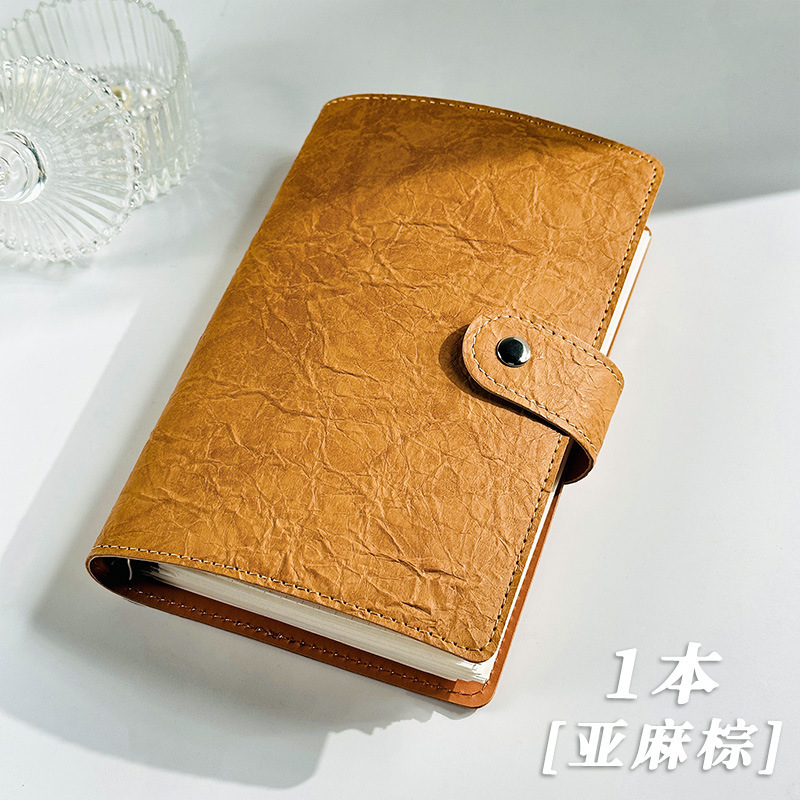 Cuaderno de cuaderno de hoja plegada a5 desmontable de alto valor de superficie cuaderno en blanco cuaderno de hoja interior sello de viaje sello