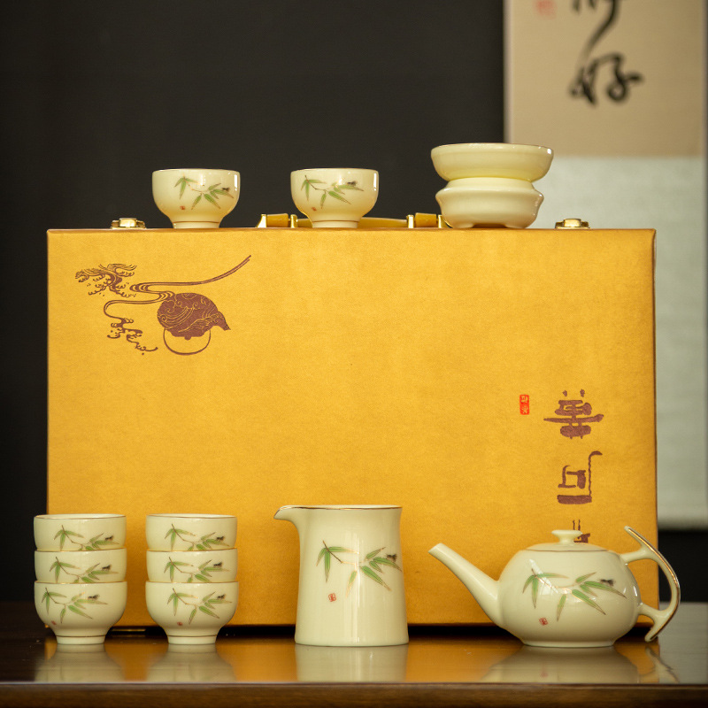 Dehua mutton-fat jade tea set gift box Chinese gold-painted white porcelain cover bowl teapot tea bowl living room commercial set