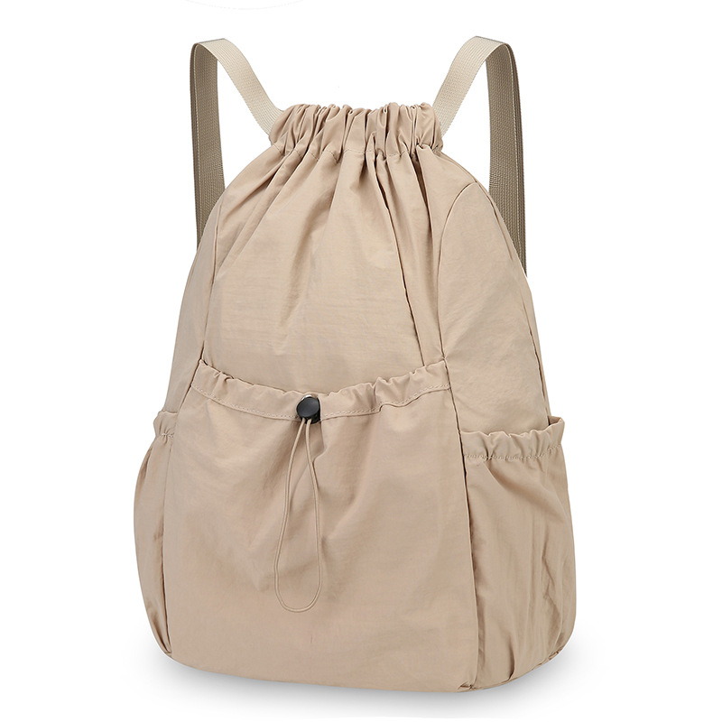 Mochila de cuerda ligera comercio exterior mochila al aire libre coreana de gran capacidad de mujeres viajes viajeros ociosos bolsa al por mayor