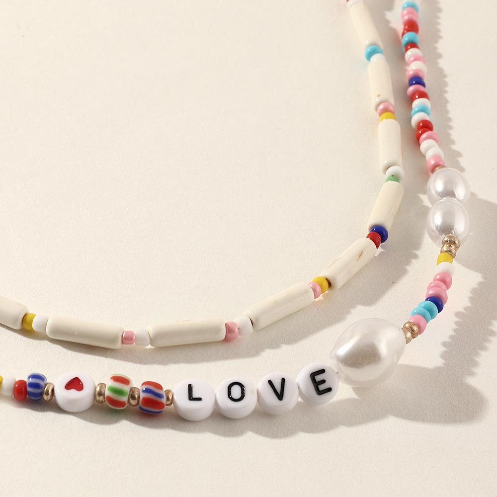 Ethnic Stacked Letter Pearl Beaded Multi-layer Necklace display picture 1