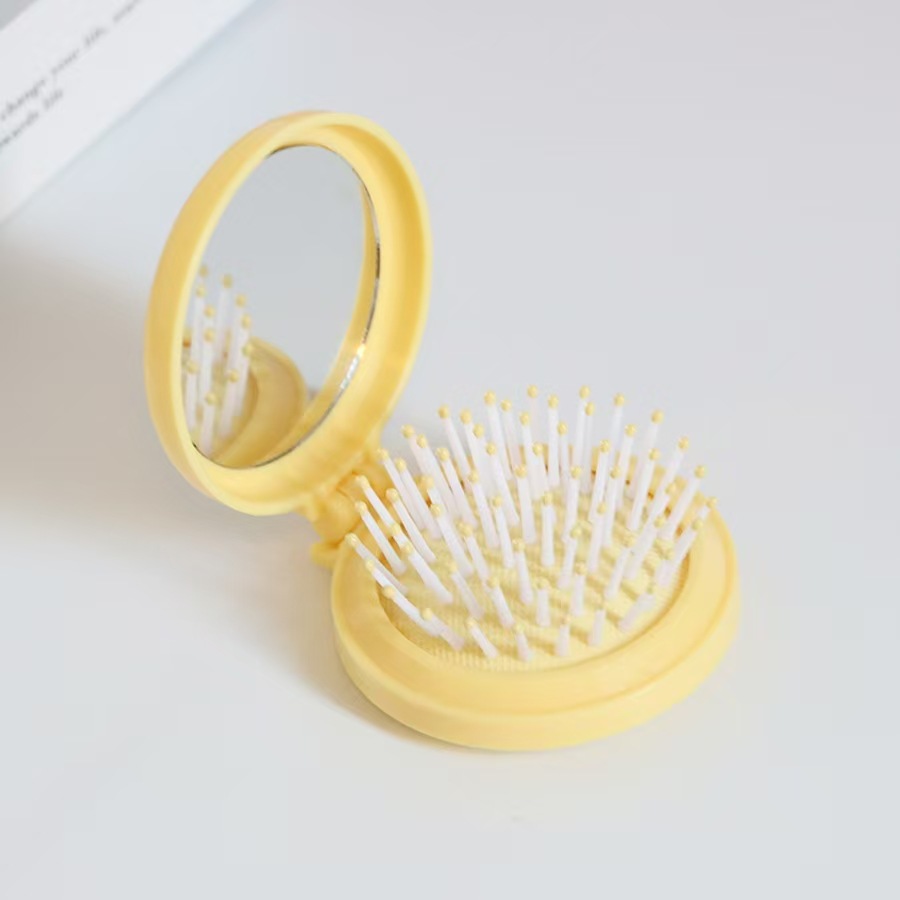 Airbag plegable Pequeño peine con espejo de maquillaje DIY adorable cojín de aire de niña cabeza de masaje portátil peine espejo todo en uno