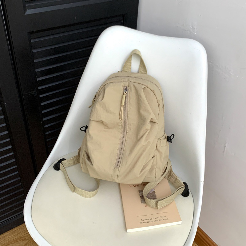 Academy-style backpack for men and women, solid color, simple and lightweight, trendy travel backpack, lightweight Korean version, high aesthetic value
