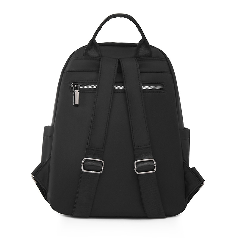 Comercio exterior al por mayor 2023 nueva mochila de nailon casual para mujer, mochila de viaje al aire libre literaria simple, mochila escolar