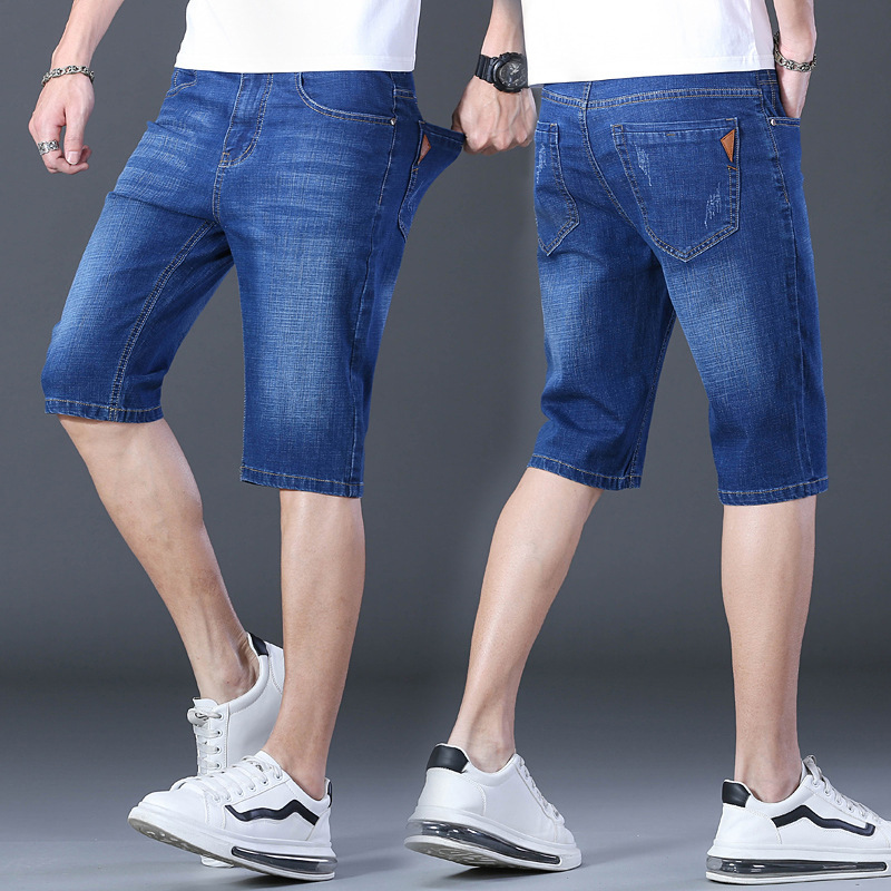 夏の薄いタイプの7分のズボンの男性のまっすぐな筒の紳士服のデニムのショートパンツの弾力性は夏の青年の中でズボンを修理します。|undefined