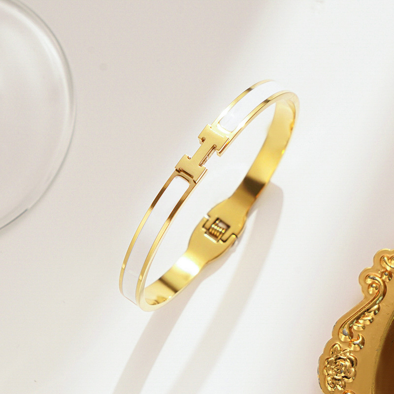 Gold and white bracelet