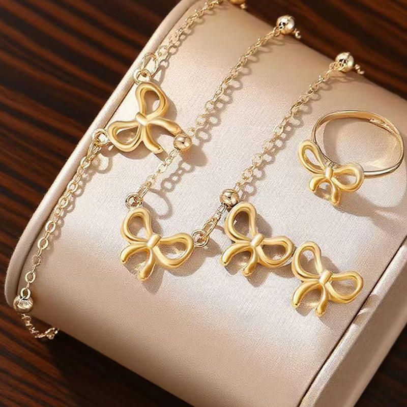 Fashionable and Versatile Bowknot Necklace, Bracelet, Earrings, and Ring Four-Piece Set for Women, Trendy and High-End Jewelry Set