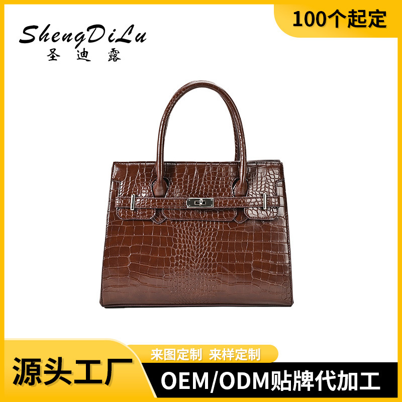 Brown crocodile-pattern handbag for women with adjustable shoulder strap, versatile for daily use, minimum order 100 pieces, direct from the factory