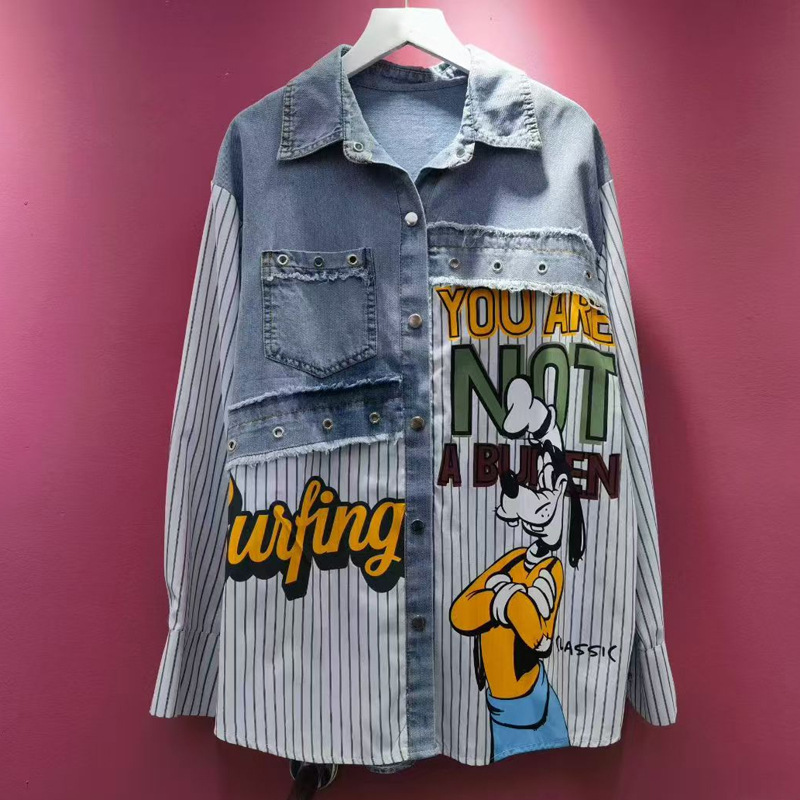 Trendy European-style oversized patchwork denim shirt with cartoon prints, a fashionable autumn streetwear piece for women