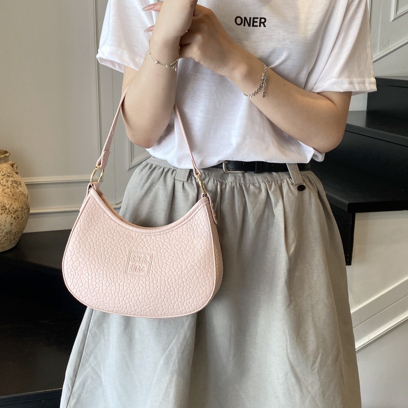 Bolso de moda coreano 2025 verano nuevo bolso femenino moda patrón de lichi bolso de hombro letra simple bolso de mensajero