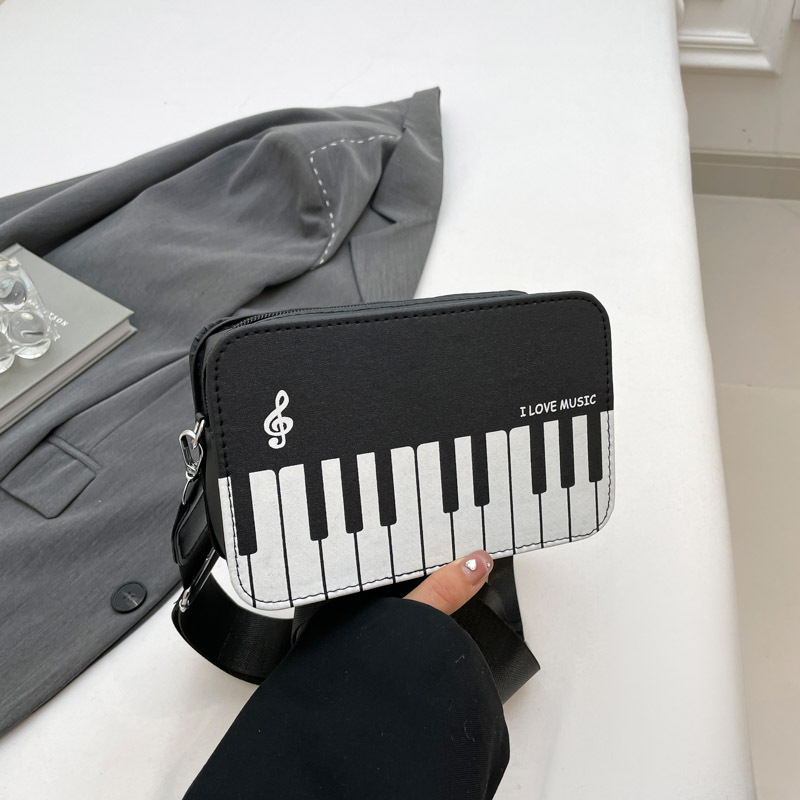 2025 invierno nueva moda color contraste pequeño bolso cuadrado niña dulce personalidad piano notas pequeñas bolso femenino portátil