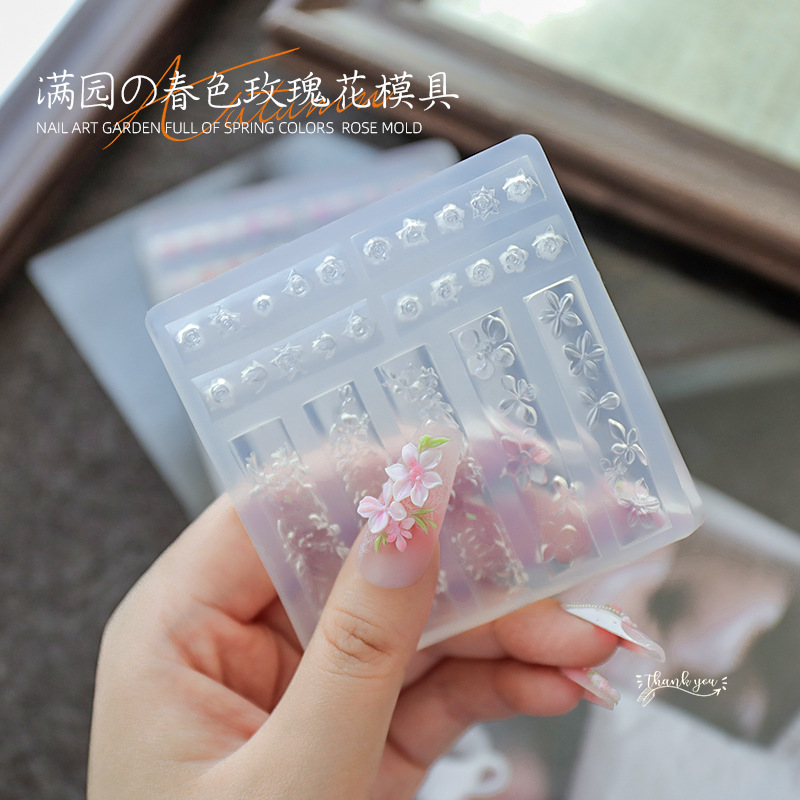 Red de celebridades modelo de explosión de uñas molde de relieve de silicona 3D jardín lleno de flores de primavera rosa serpentina tridimensional molde de pétalos al por mayor