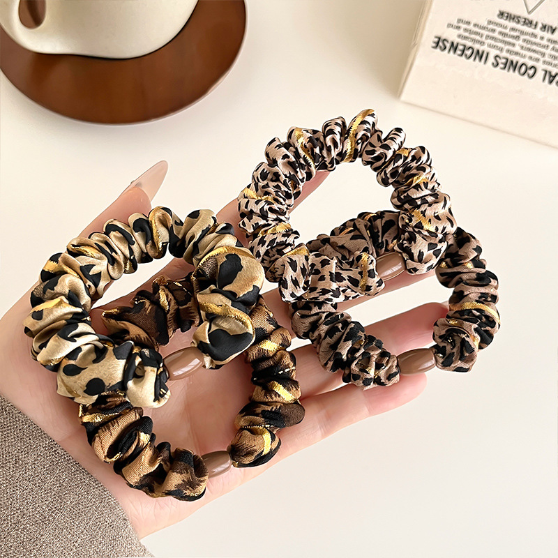 Temperamento europeo y americano estampado leopardo anillo de cabello simple de alta elástica cuerda de cabello gruesa cuerda de cabello de bolas duradera correa
