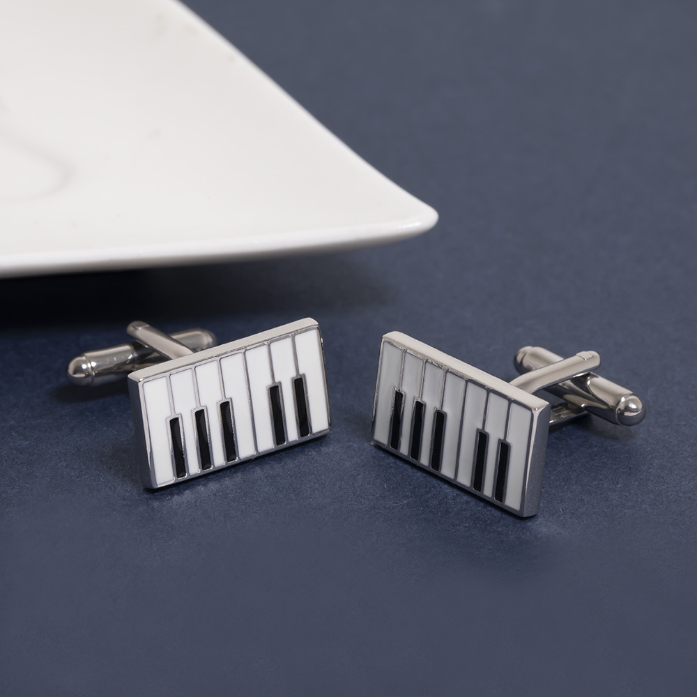Gemelli in metallo per pianoforte di alta qualità, semplici chiodi a goccia in lega per polsini a righe bianche e nere all'ingrosso_voghion.com