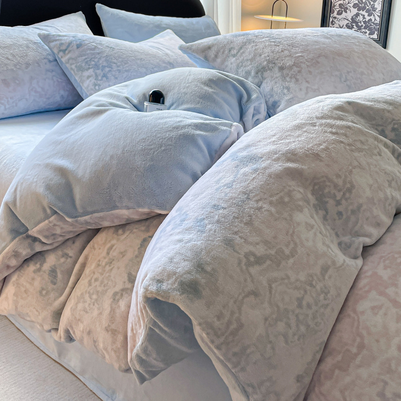 Cama de seda de leche infantil de cuatro piezas de invierno sábanas de lana de coral cubierta de cama de lana de doble cara 2025 nuevo