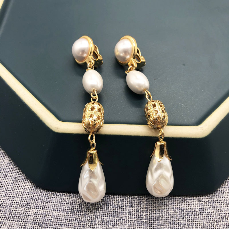 Fashion White Pearl Retro Water Drop Earrings display picture 12