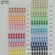 现货 涤棉泡泡朝阳格格子面料 玩具工艺品女装裙装童装帽子面料
