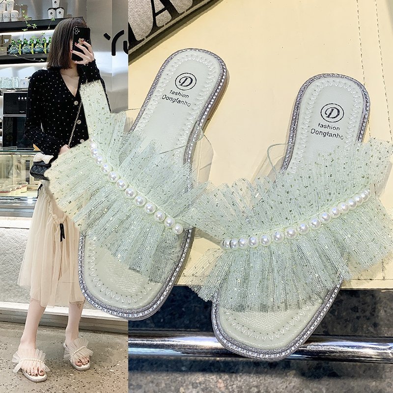 Cool slippers girl 2021 summer new pattern fashion Korean Edition Flat bottom Pearl Lace Word tow Sandy beach sandals