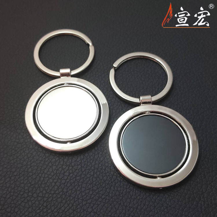 Round geometric rotating keychain