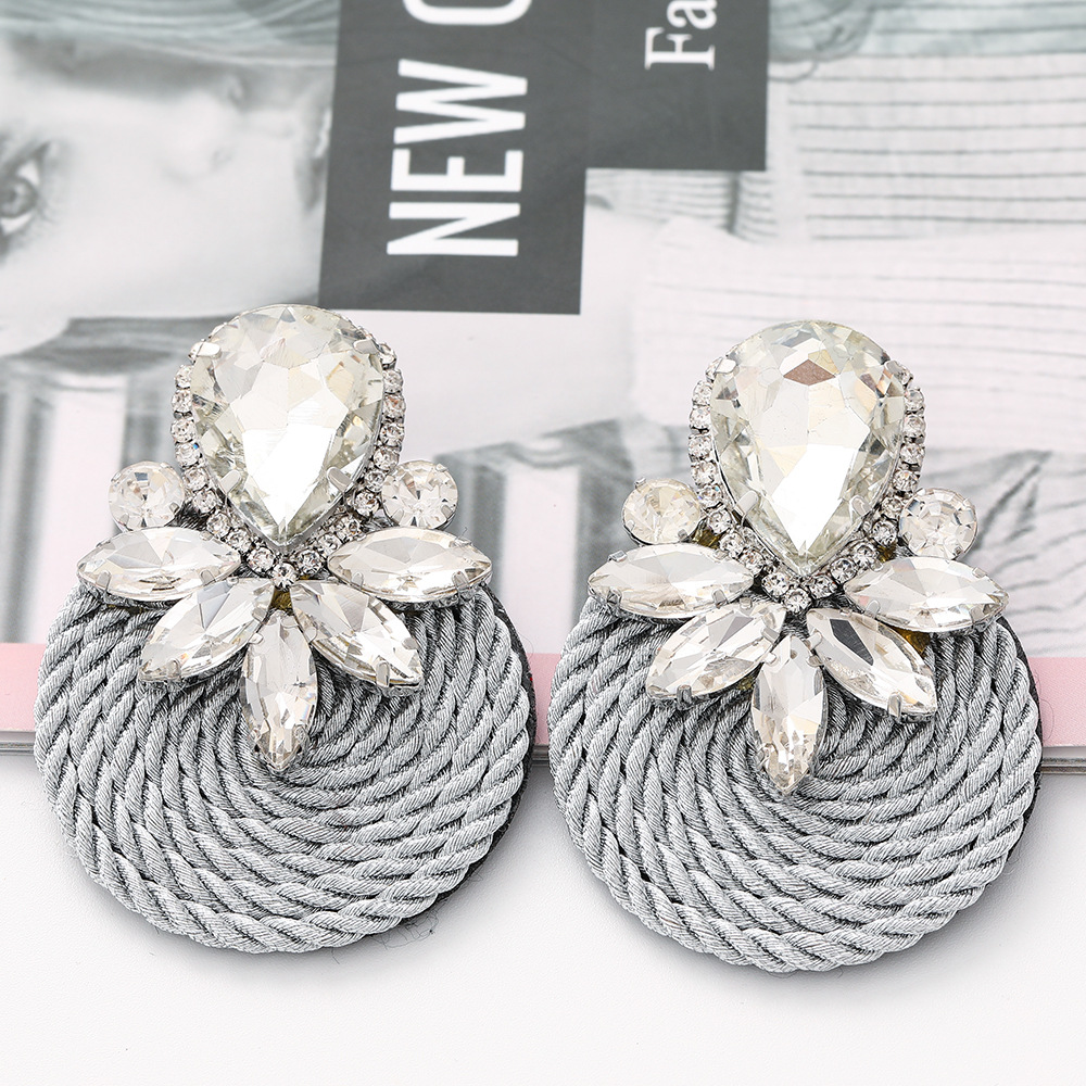 Fashion Round Diamond Braided Earrings display picture 19