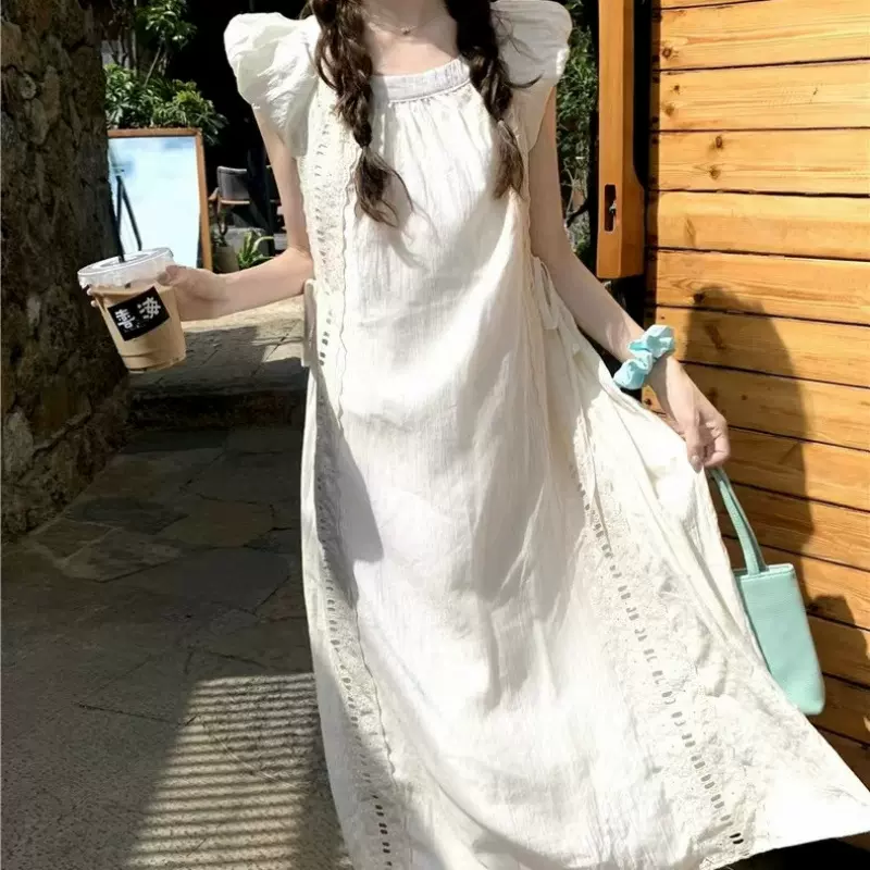 法式温柔风镂空飞飞袖系带连衣裙夏季新款多巴胺褶皱气质长裙ins