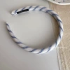 Narrow black and blue line diagonal strips