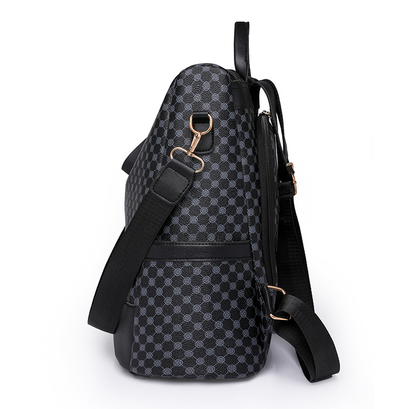 Comercio exterior al por mayor 2023 nueva versión coreana de las señoras de cuero suave mochila antirrobo moda contraste color bolsa de viaje al aire libre de doble uso