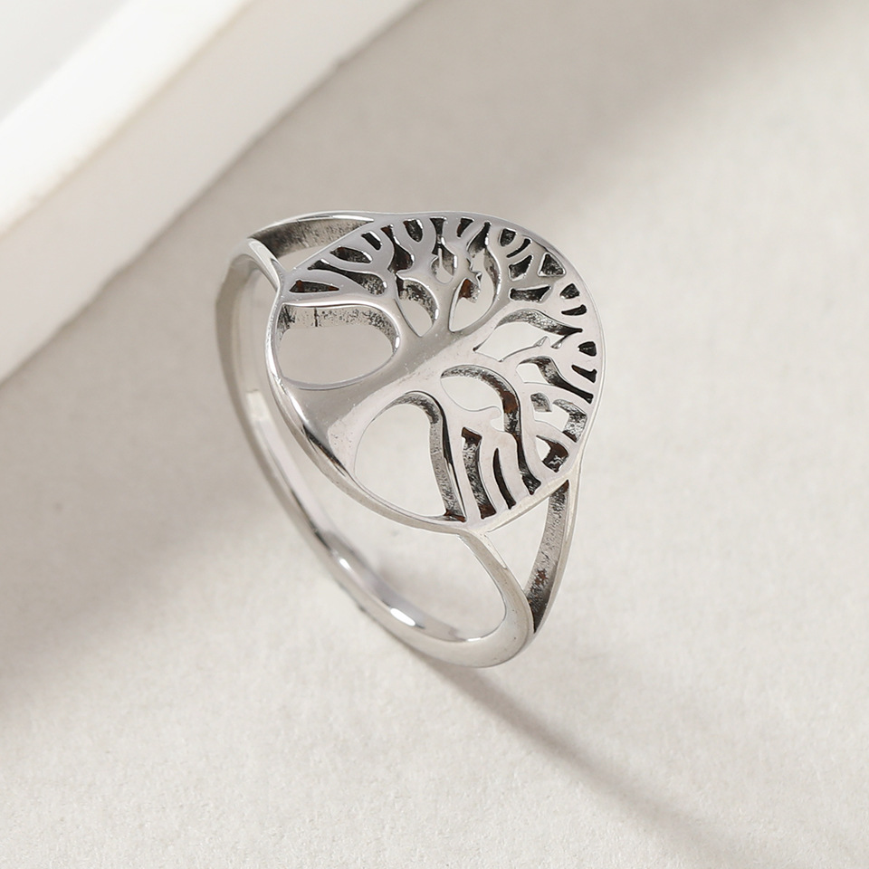 Suministro transfronterizo europeo y americano anillo de acero de titanio personalidad creativa hueco vida árbol pareja anillo de moda joyería fábrica image 5